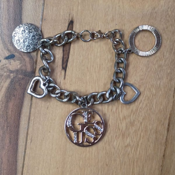 GUESS Silver-Tone Chain Charm Bracelet with Rhinestone and Logo Charms