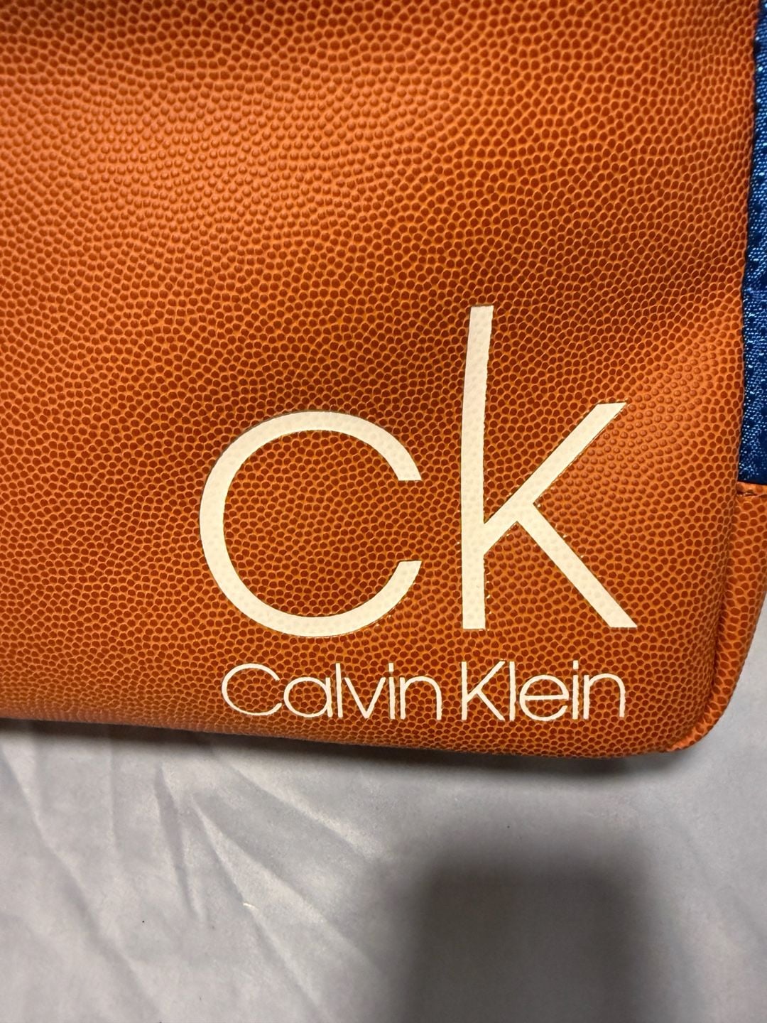 Calvin Klein Blue and Orange Basketball Textures Backpack with CK Logo 3