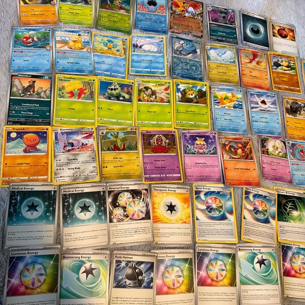 Pokemon Card Bulk Lot 50 cards and code Assorted Common Uncommon Energy Trainer Cards