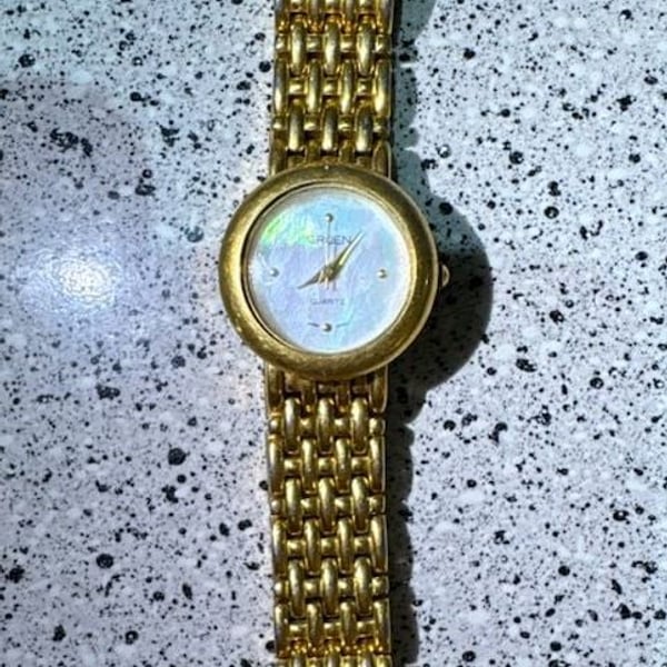 Gruen Quartz Women's Gold Tone Watch with Mother of Pearl Dial