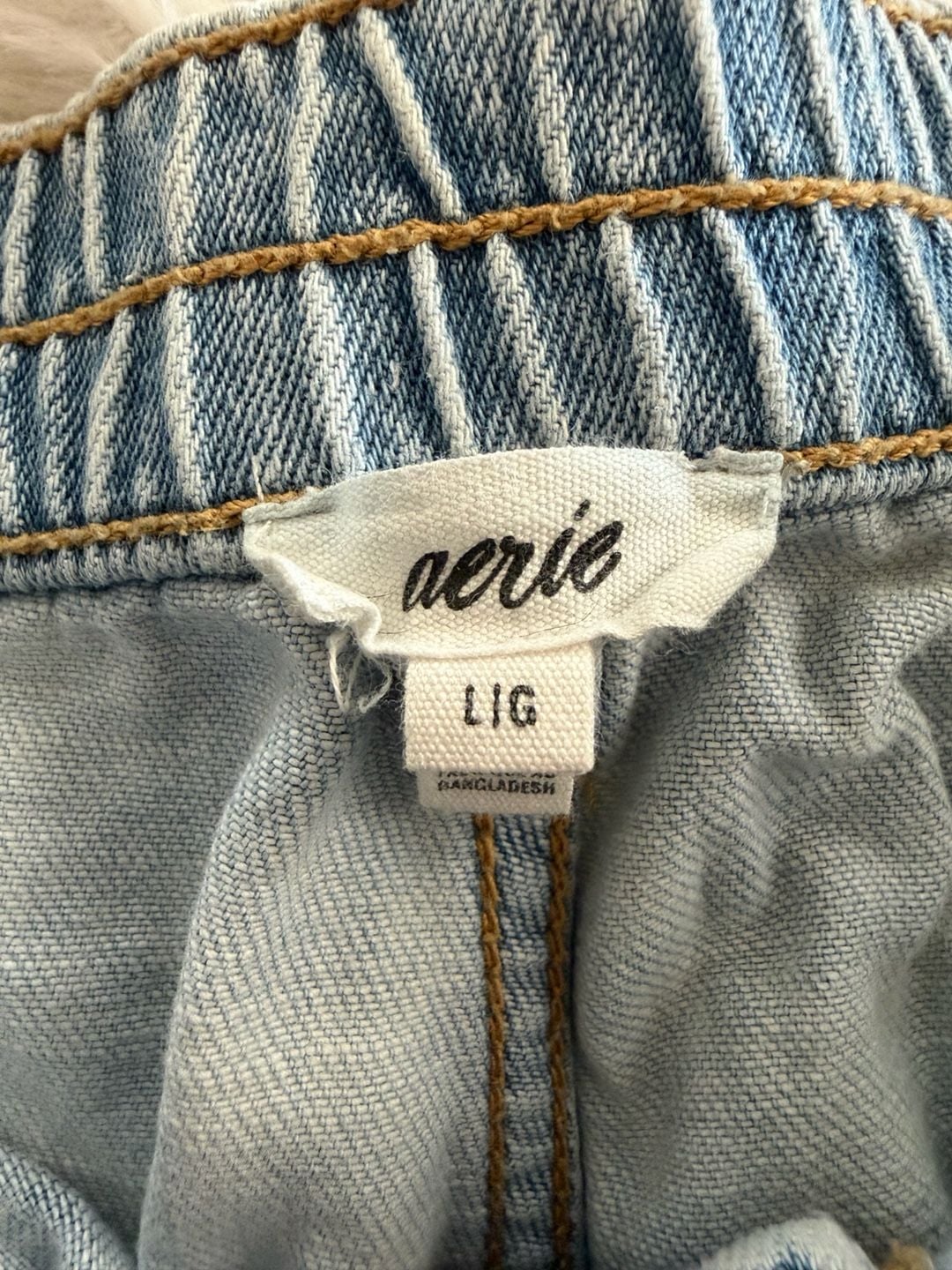 Aerie light wash high rise festival frayed raw hem denim shorts 4