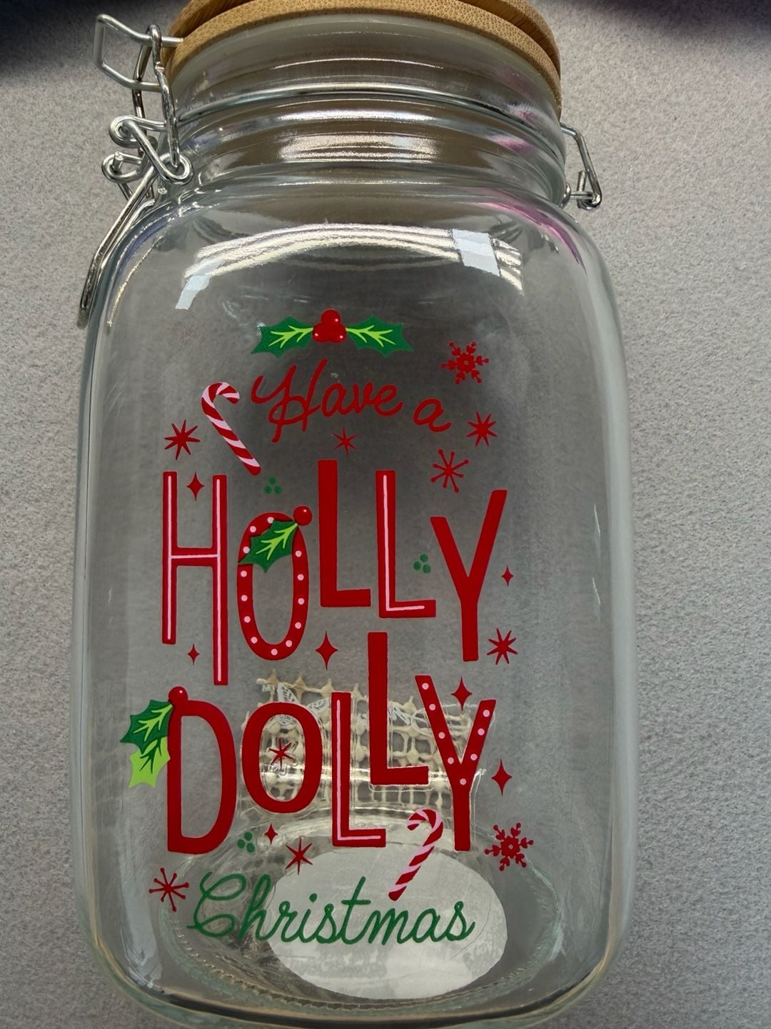 Dolly Parton Christmas Holiday Glass Storage Jar with Wire Clasp Lid and Holly Jolly Design 1