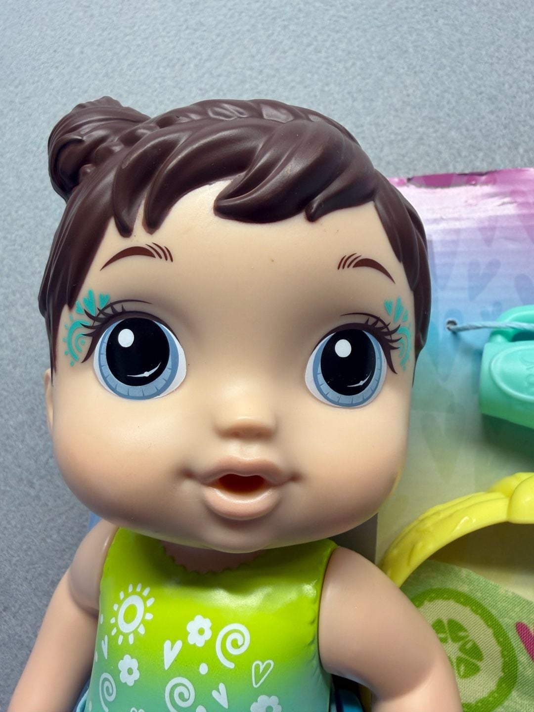 Baby Alive Rainbow Spa Baby Doll with Brown Hair and 4 Accessories 2