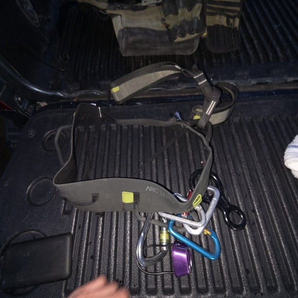 Arc'teryx Climbing Harness with Assorted Carabiners and Gear