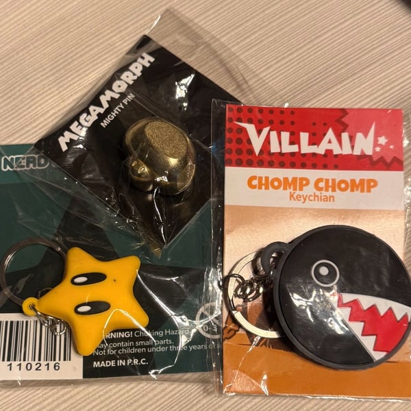 Nerd Block Nerdcre8 Super Geek Box Exclusive 3qty - Invincibility Super Star Pin, Mega Morph, & Chomp Chomp Villain Keychains