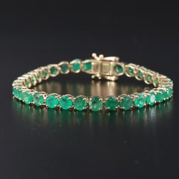 14K yellow gold 4-Prong natural Emerald Tennis Bracelet