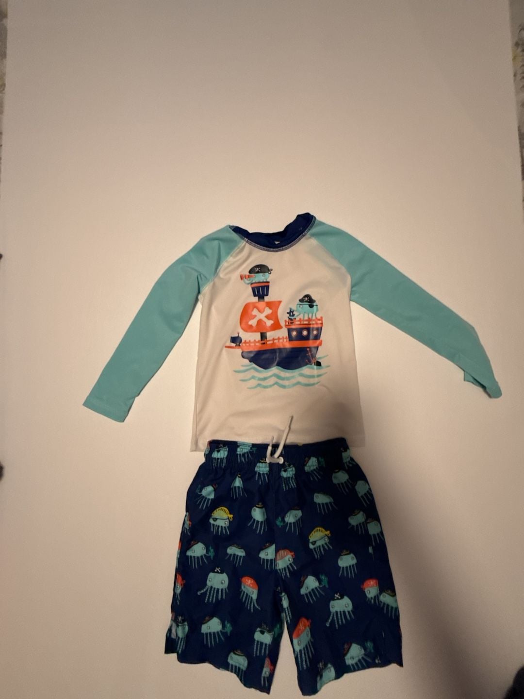 The Children's Place Boys Toddler Long Sleeve Rashguard and Swim Trunk 2 Piece Set Pirate Octopus 5T 2