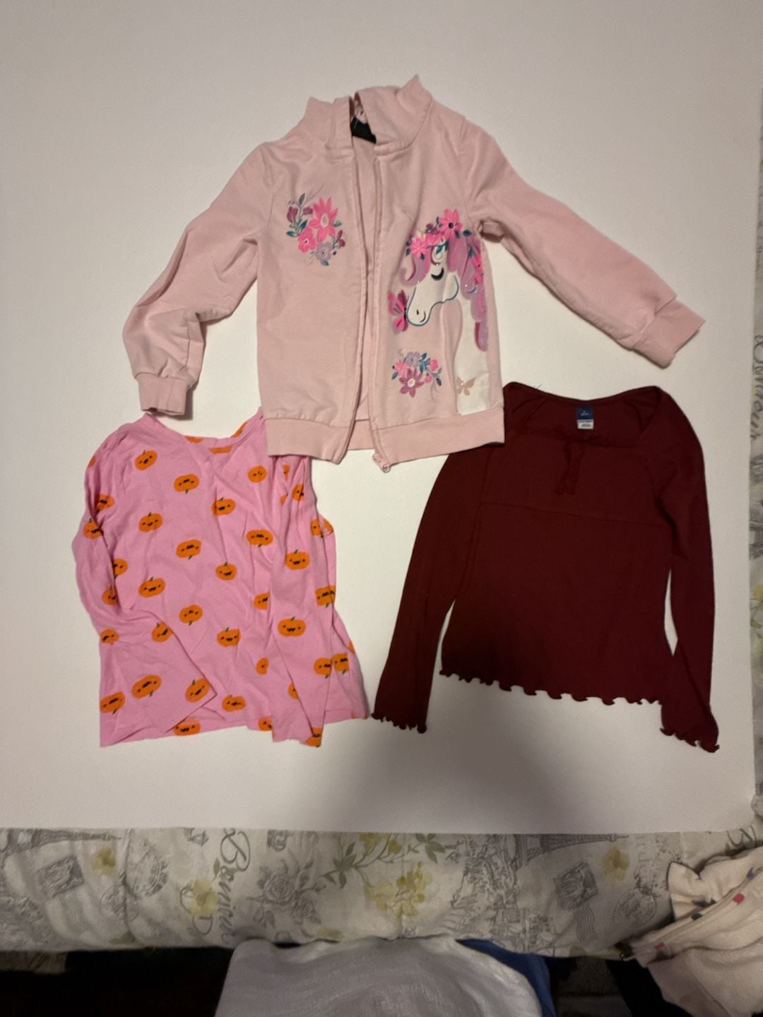 Girls 3-Piece Clothing Bundle: Pink Unicorn Full-Zip Hoodie, Pink Pumpkin Long Sleeve Shirt, and Burgundy Ruffle Top 1