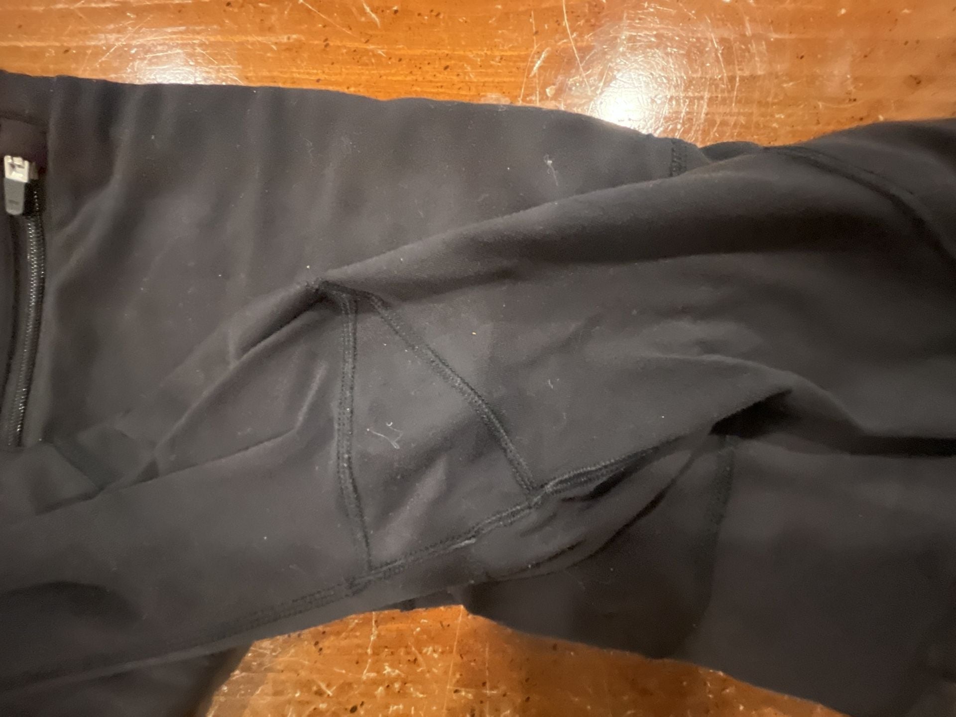 Oiselle Women's Black Leggings with Zip Waist Pocket and moto detailing 9