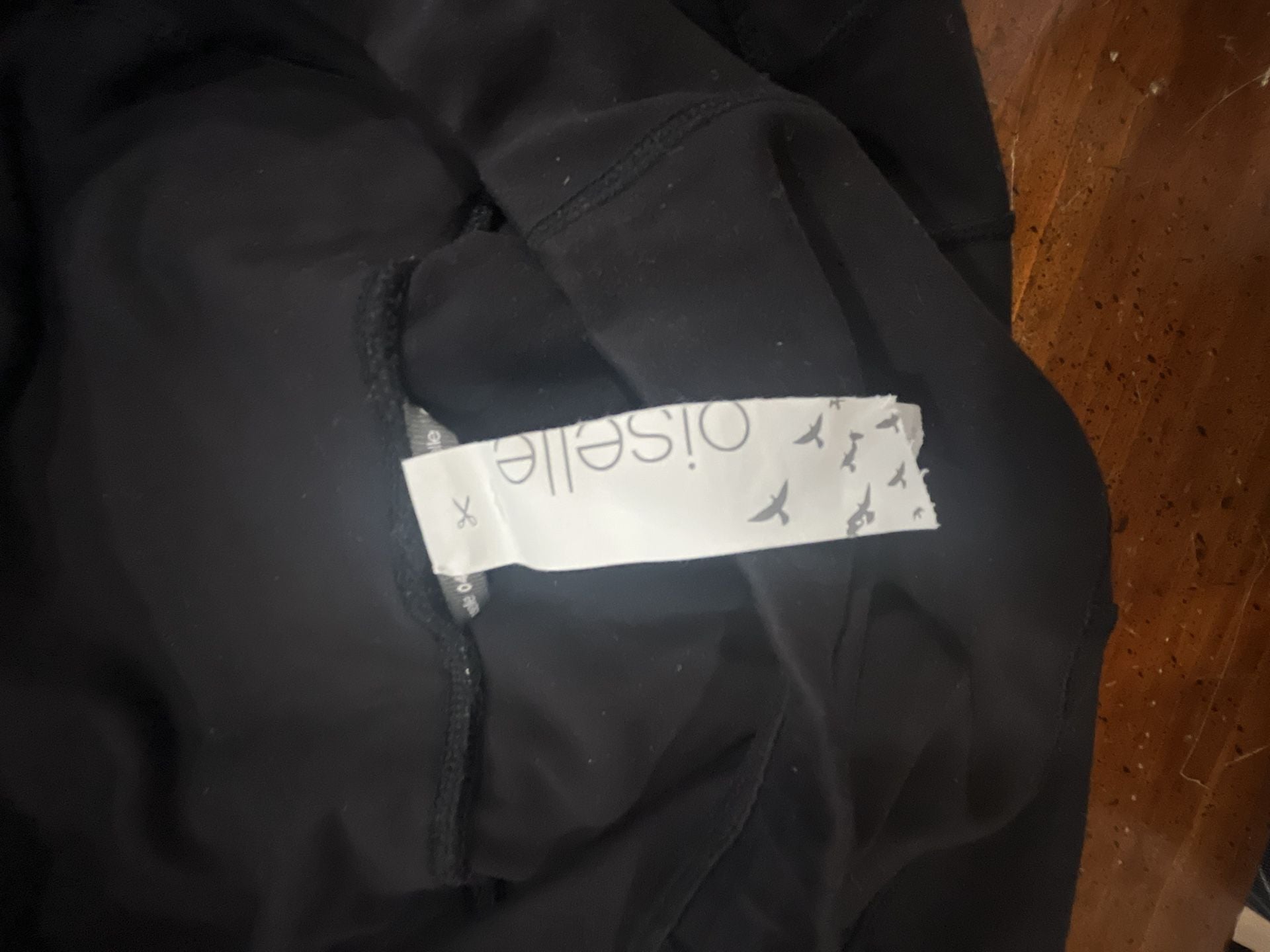 Oiselle Women's Black Leggings with Zip Waist Pocket and moto detailing 10