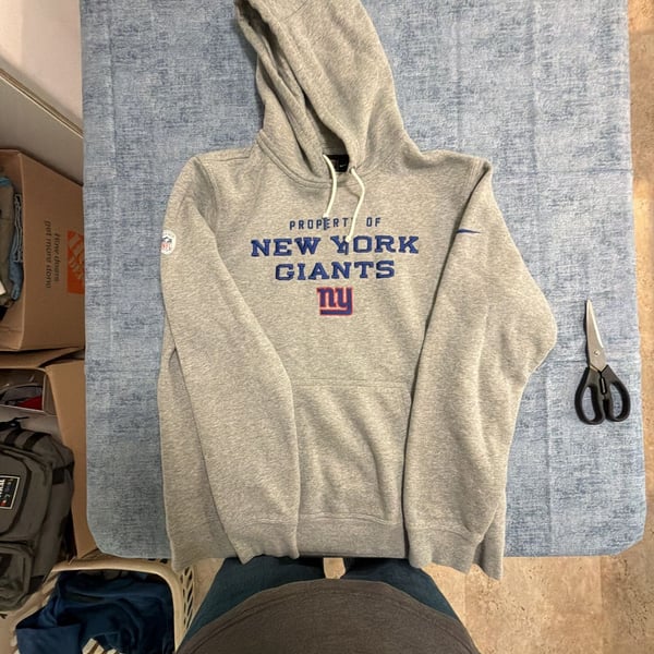 Nike NFL New York Giants Property Of Hoodie Sweatshirt Gray Men's Size Large. If the Giants keep winning this year, I might have to go up in price.