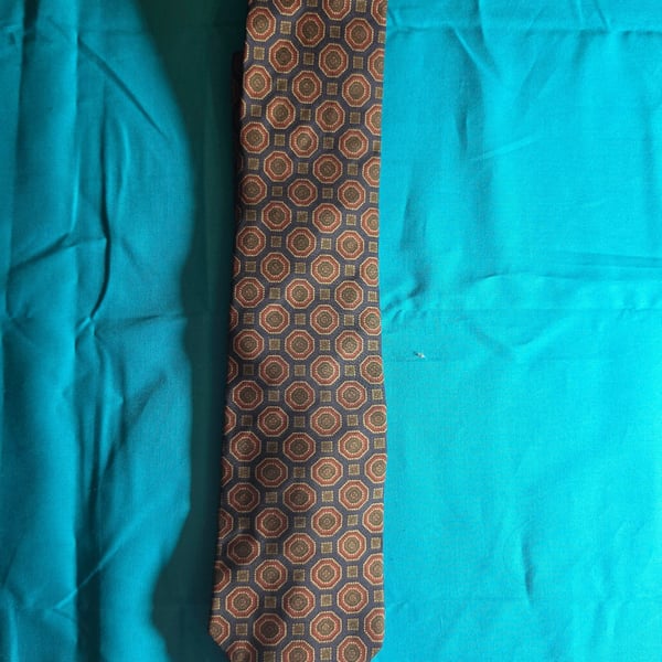 Equus Silk Necktie Blue with Geometric Medallion Pattern