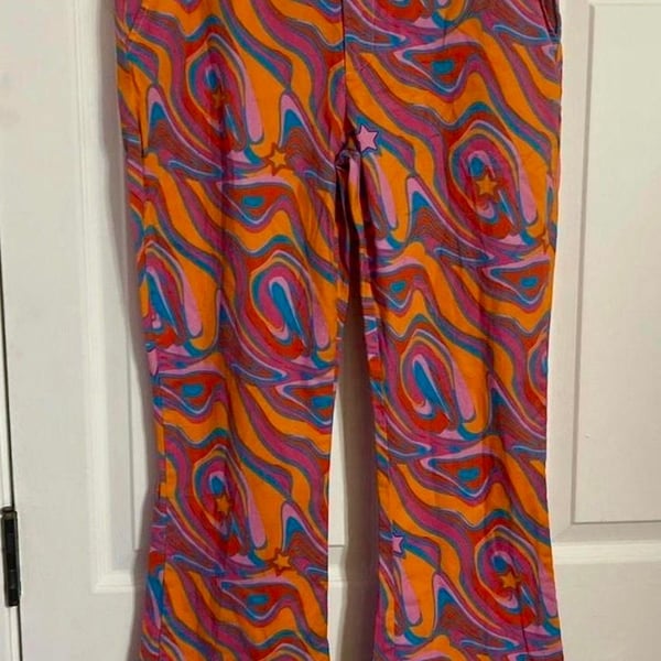 Groovy women’s  flared pants , 70s Hippie Costume , psychedelic neon swirls and stars, med