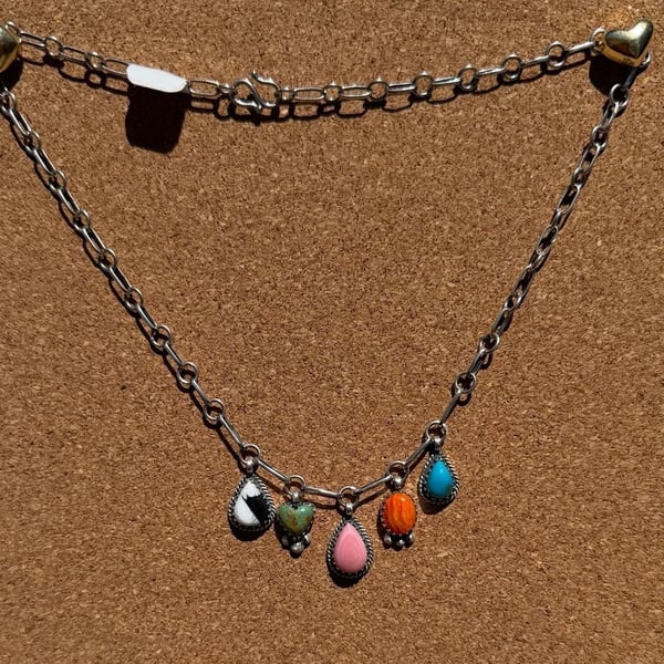 Handmade Sterling Silver Multi Stone Charm Necklace with all natural Teardrop Stones
White buffalo, turquoise, pink conch, orange spiney