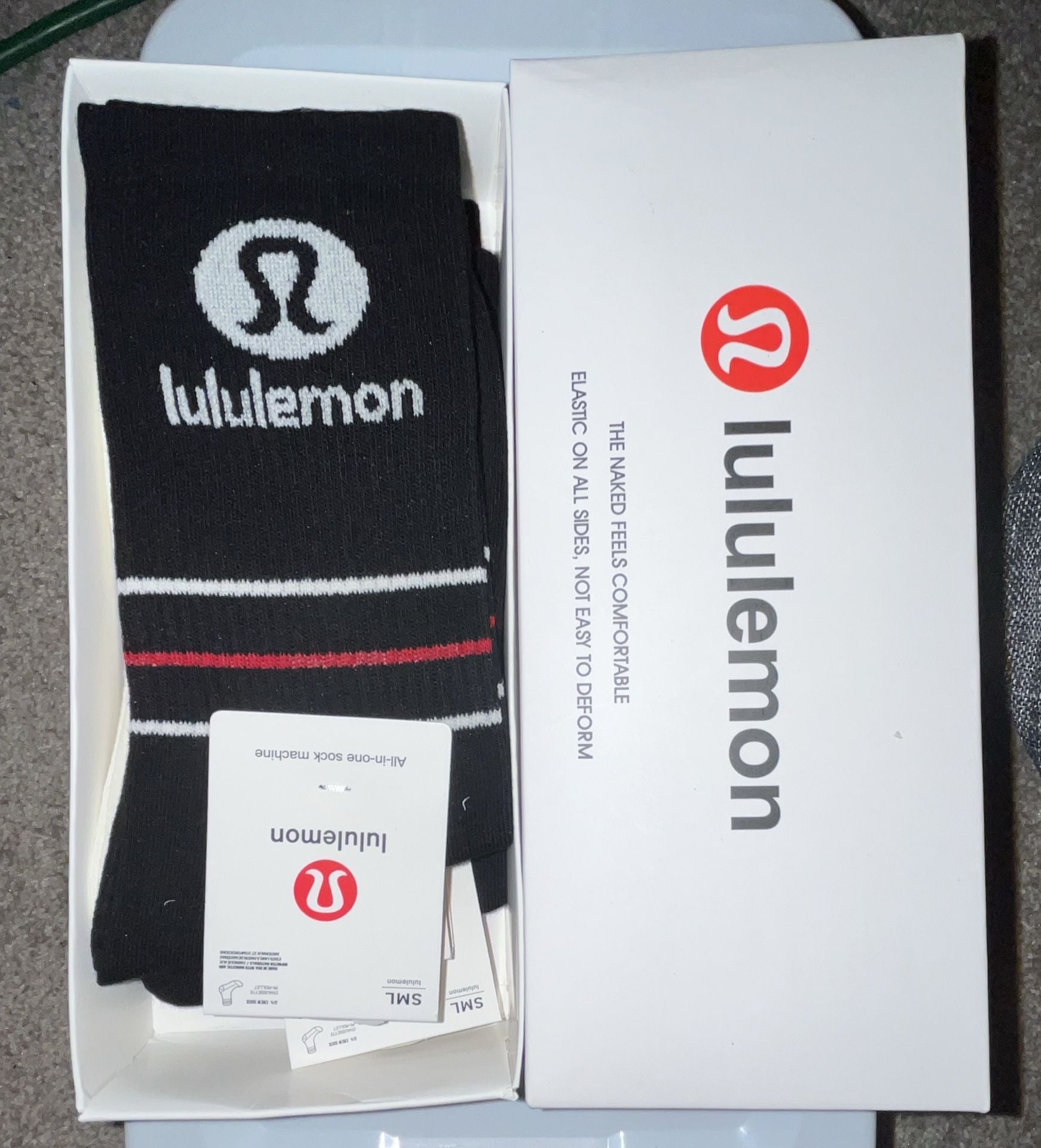 Lululemon Black Crew Socks with White and Red Stripes and Logo 1