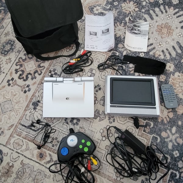 Durabrand Dual-7C Portable DVD Player with Dual Screens and Accessories