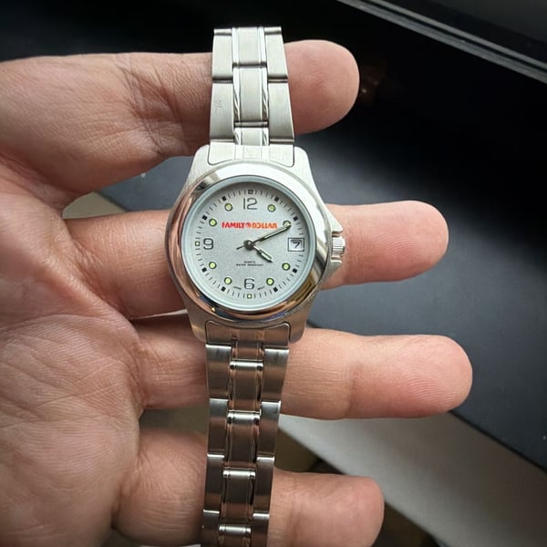 Family Dollar Quartz Analog Water Resistant Watch Silver Tone Stainless Steel