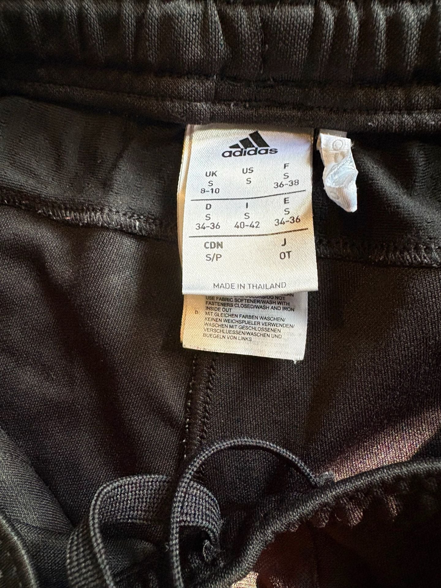 Adidas Track Suit Black. Jacket size large and pants is small 10