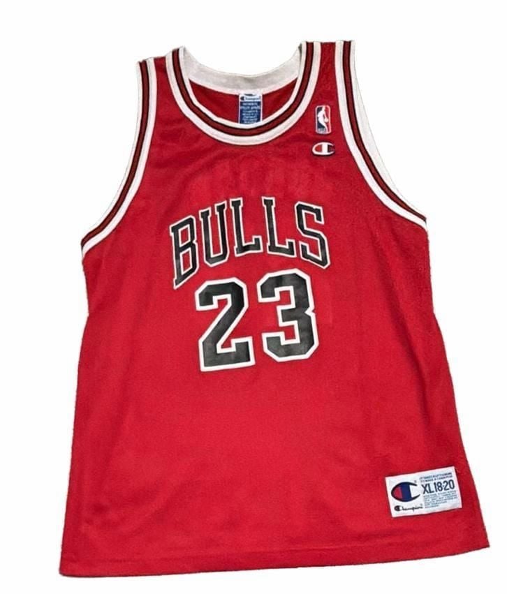 Champion Chicago Bulls Michael Jordan 23 Jersey Size XL18-20. Rare and hard to find. 2