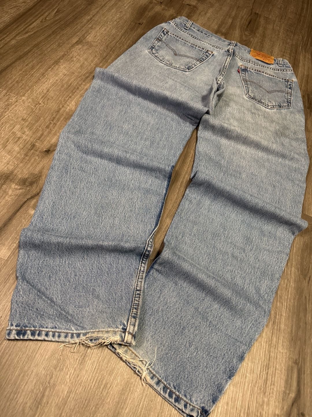 Vintage Levis Baggy Light Wash Jeans Distressed Hem

 11