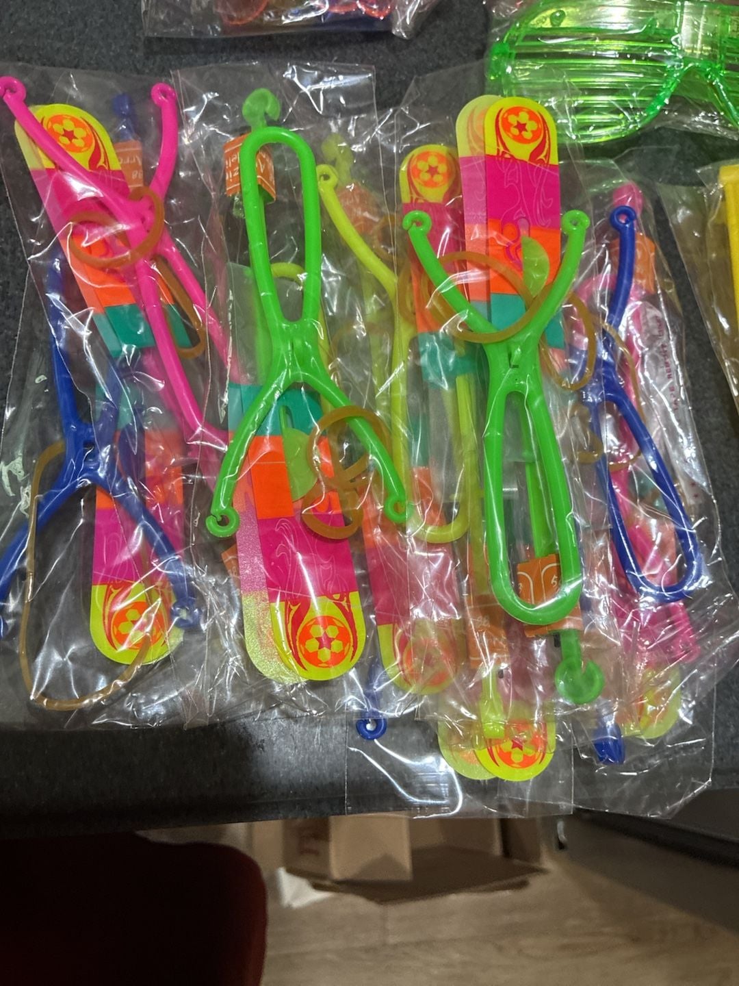 Party Favor Assortment LED Light Up Toys Slingshot Helicopters Shutter Glasses 2
