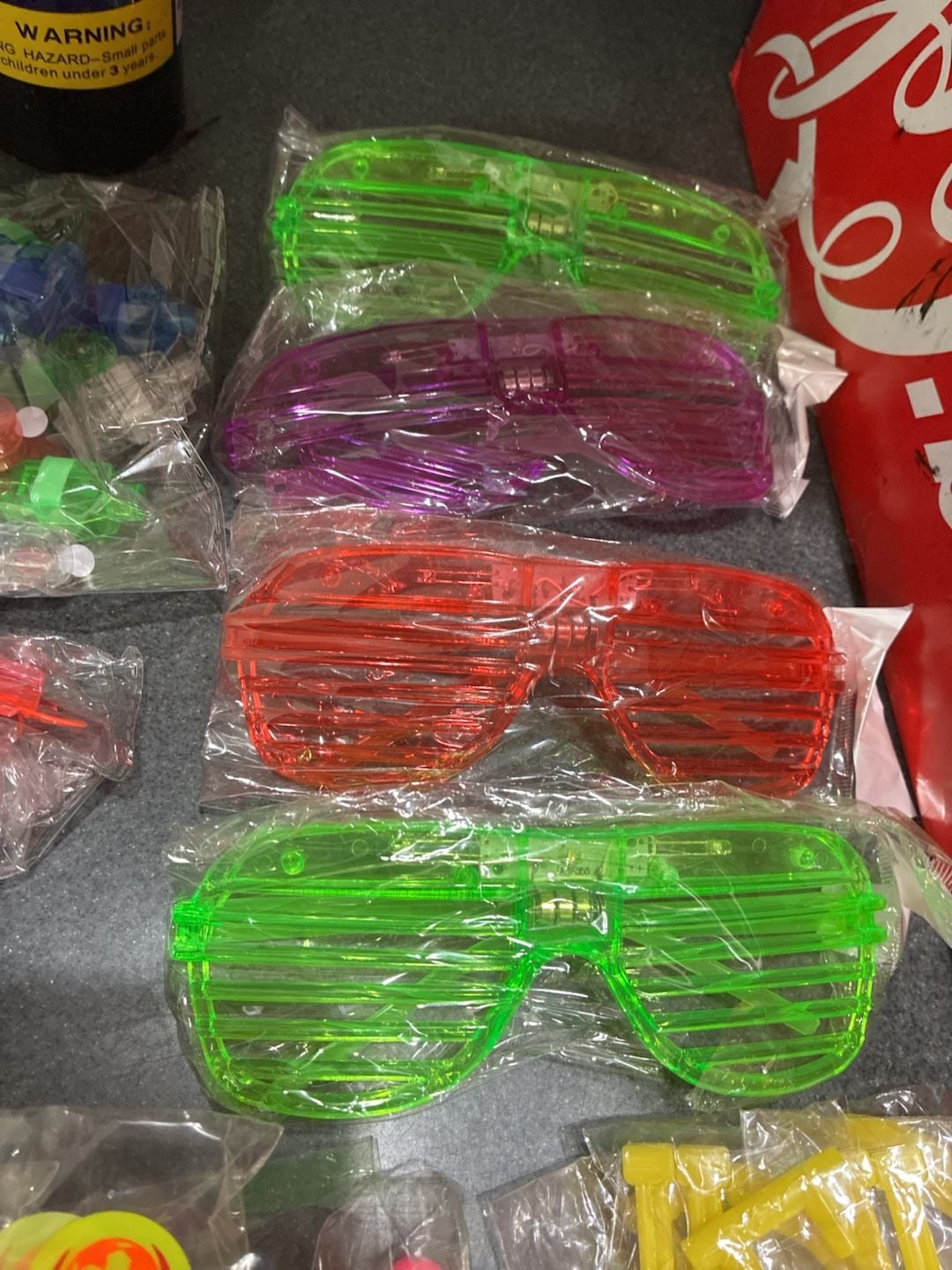 Party Favor Assortment LED Light Up Toys Slingshot Helicopters Shutter Glasses 4