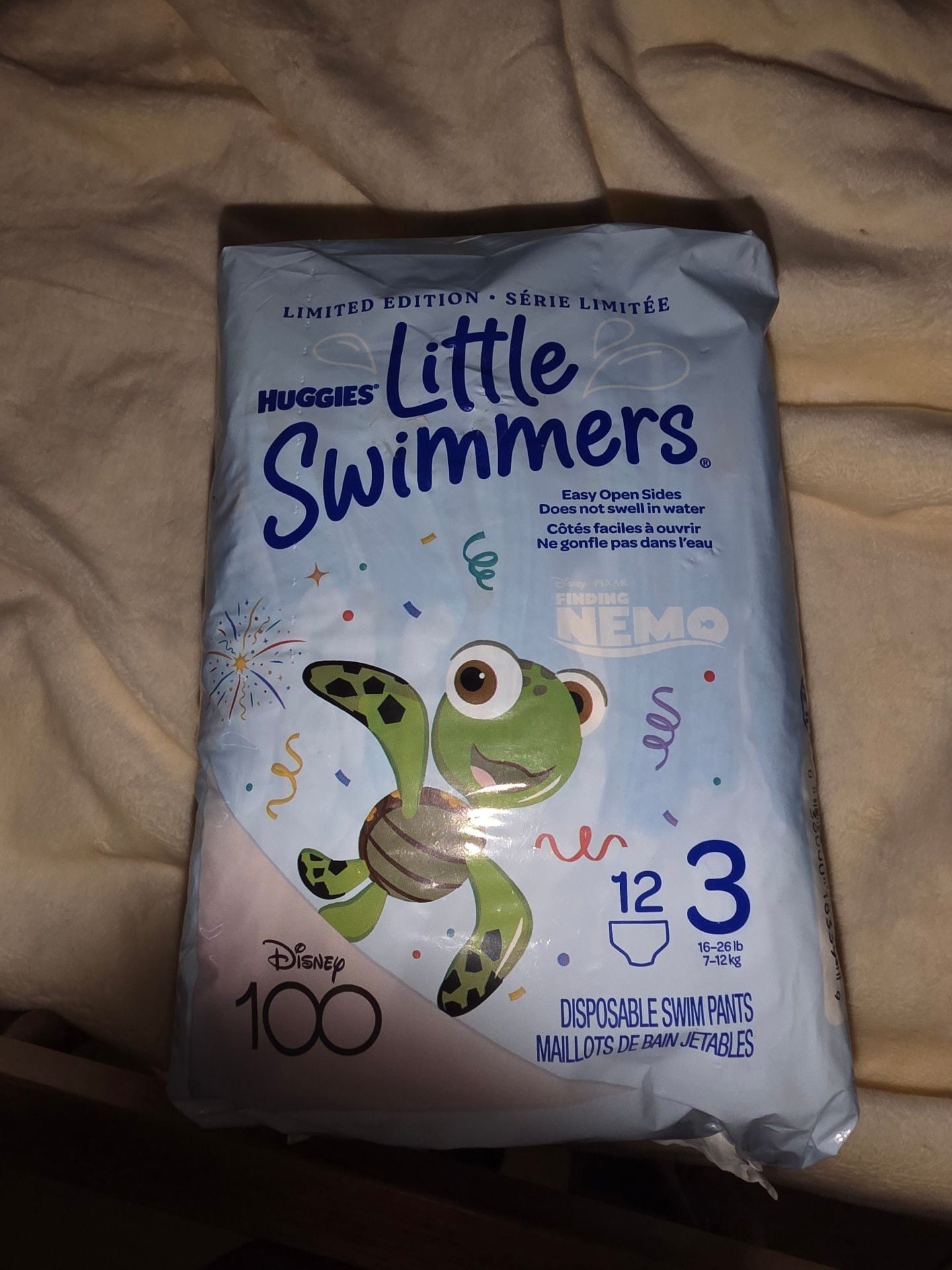 Baby bundle/Huggies Little Swimmers/bibs/slip sack/burp cloths 5