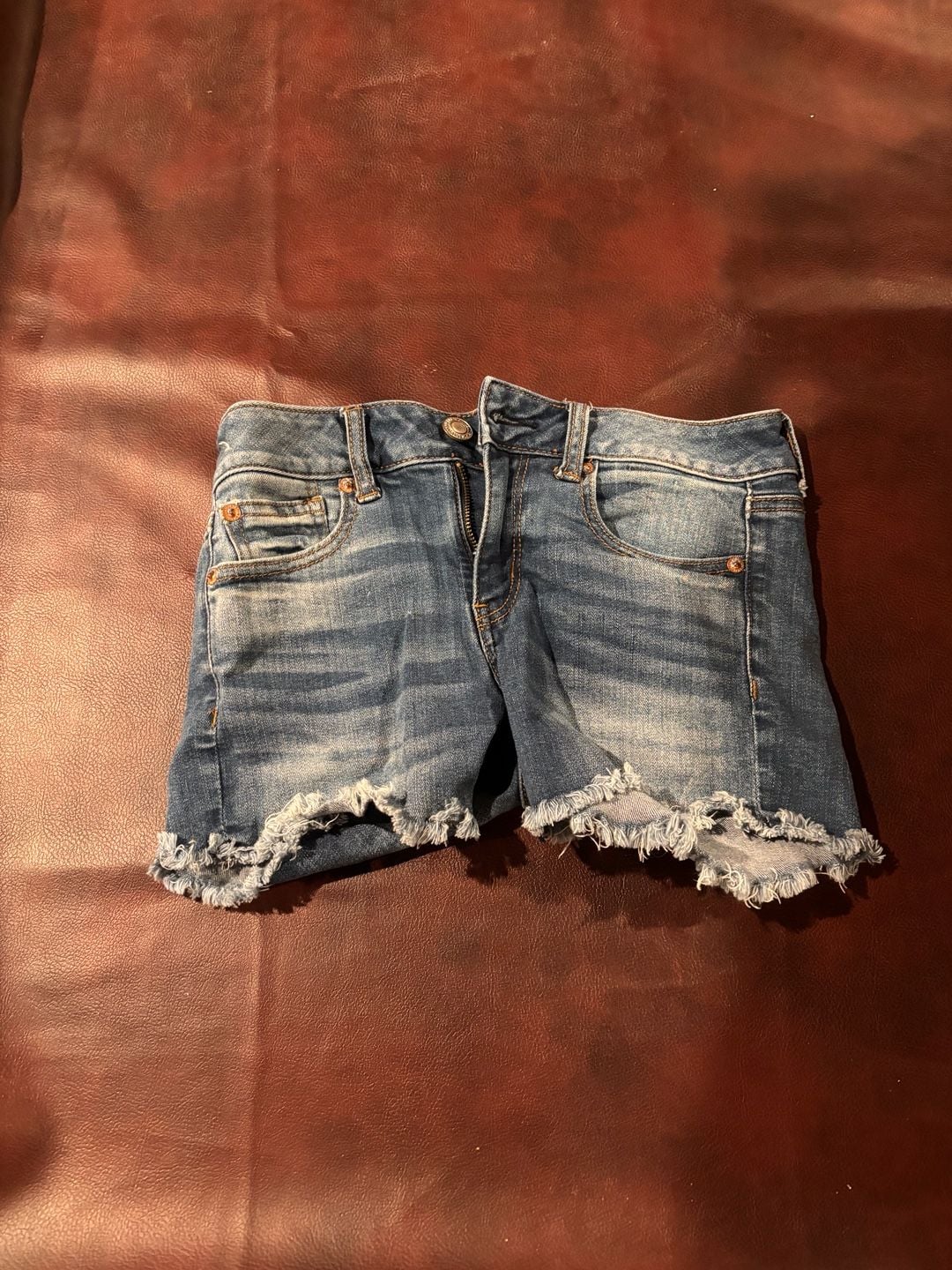 American Eagle Denim Shorts Size 0 Blue Distressed Cut Off 2