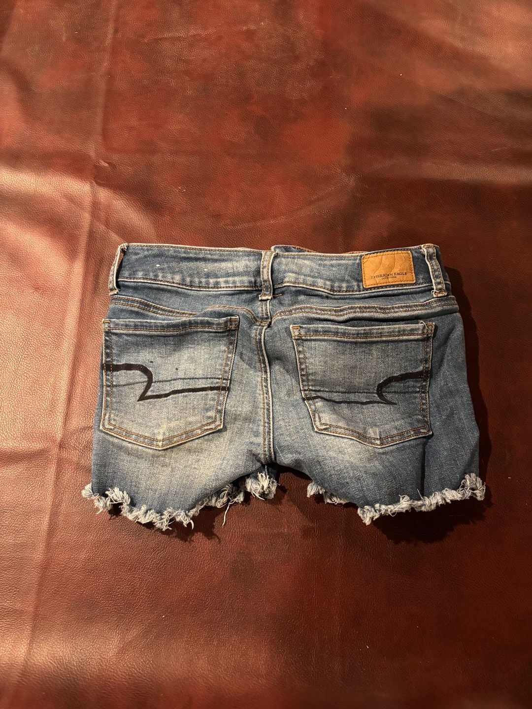 American Eagle Denim Shorts Size 0 Blue Distressed Cut Off 3