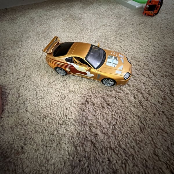 Racing Champions Fast and Furious 1995 Toyota Supra Slap Jack Gold 1:18