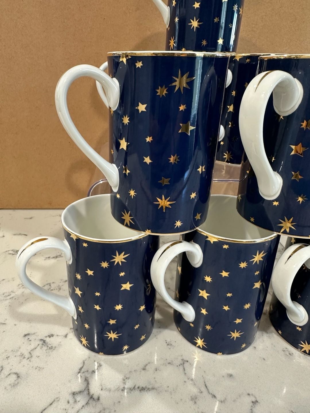 Pre owned, set of 8, Sakura Galaxy Blue porcelain coffee mugs featuring a navy blue celestial star pattern and 14K gold trim, Approximate Size: About 4 1/4 inches tall. Great condition, One of the cups has minimal sign of use, please refer to the photogra 4