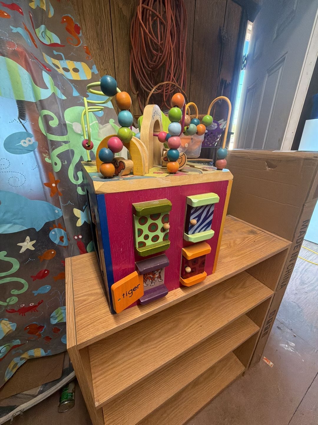 B. Toys Zany Zoo Wooden Activity Cube 1