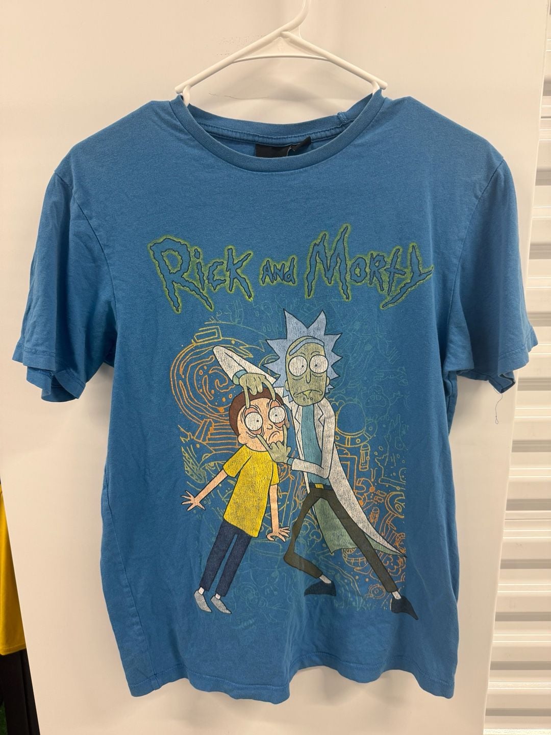 Rick and Morty Blue Rick Holding Morty's Eyes T-Shirt 1