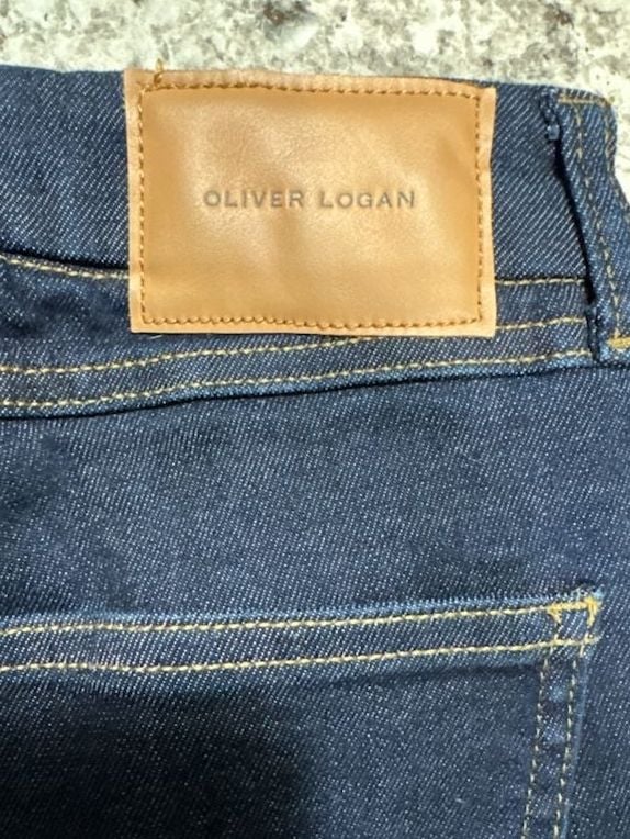 Oliver Logan Wide Leg Jeans women’s Size 24P Dark Wash Raw Hem Denim 10