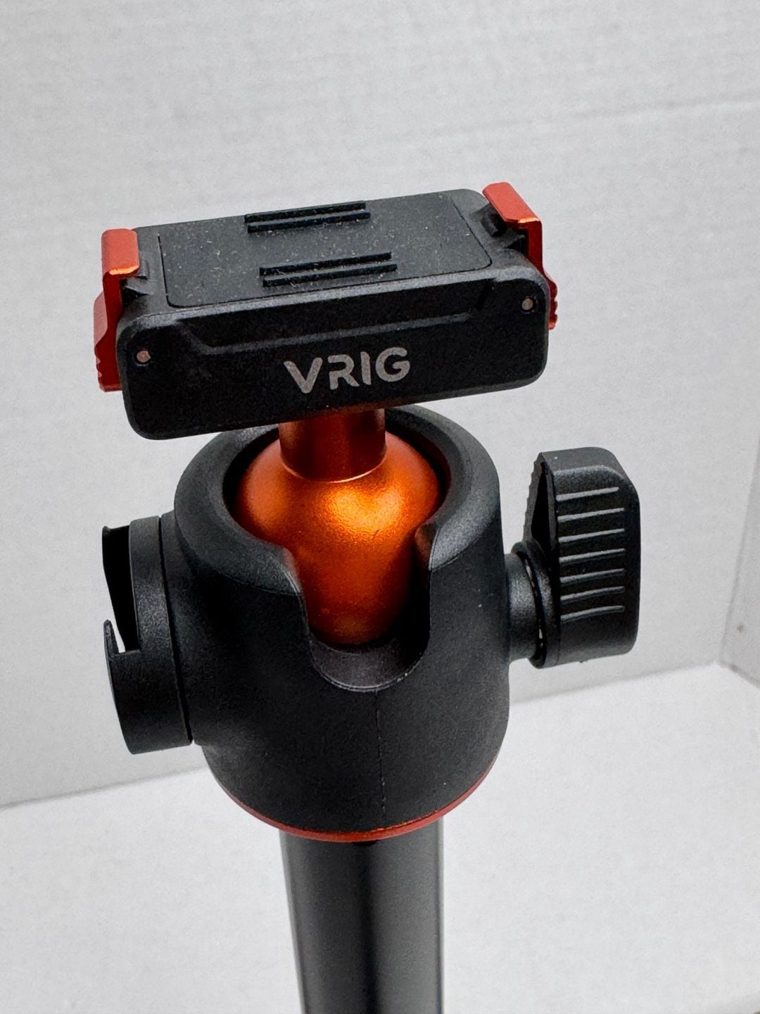 VRIG Extendable Mini Tripod Selfie Stick with Ball Head does not come with light or camera just showing you what it would look like . 2