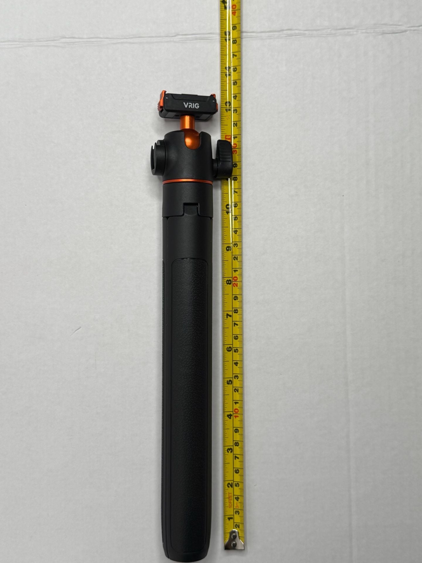 VRIG Extendable Mini Tripod Selfie Stick with Ball Head does not come with light or camera just showing you what it would look like . 5