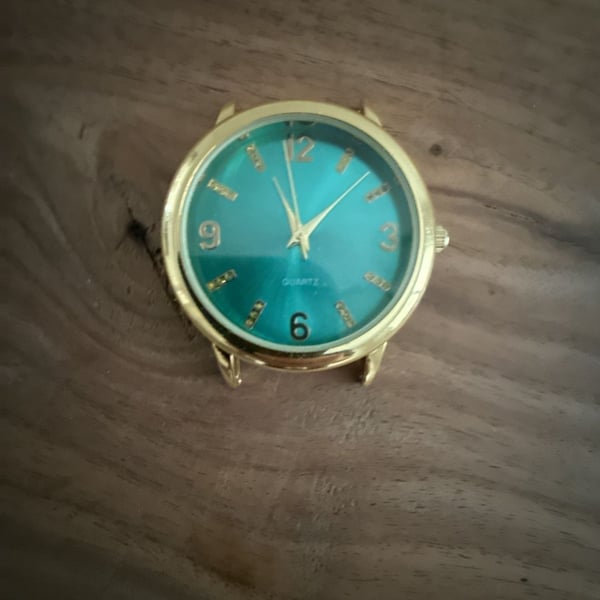 BWC Quartz Analog Wristwatch Gold Tone Turquoise Dial