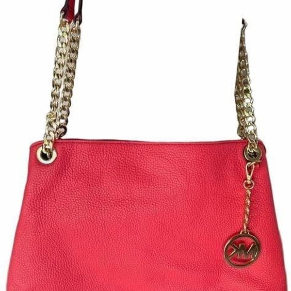 Authentic Michael Kors red leather shoulder bag true statement piece.