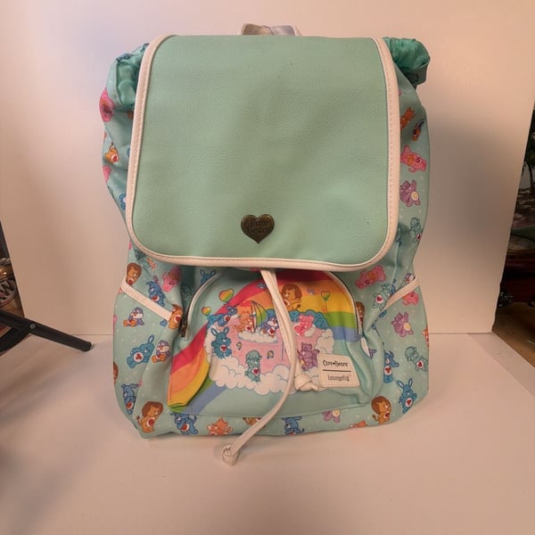 Loungefly Care Bears Cousin Rainbow Slouch Backpack