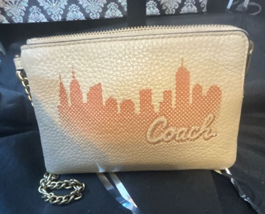 Coach x JLo Wristlet  NWOT 7