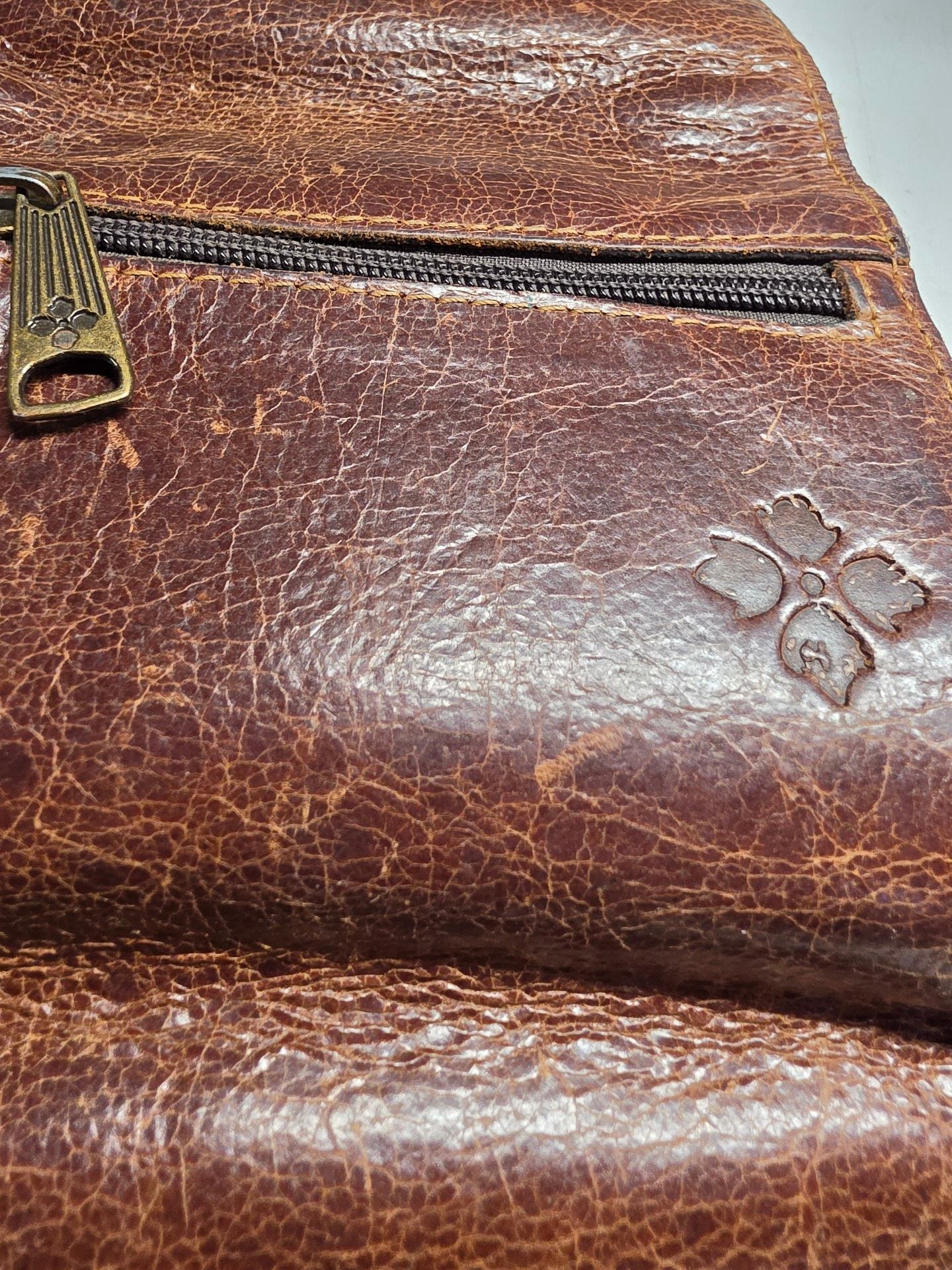 Patricia Nash Distressed Brown Leather Wallet Metal Bar Logo 6