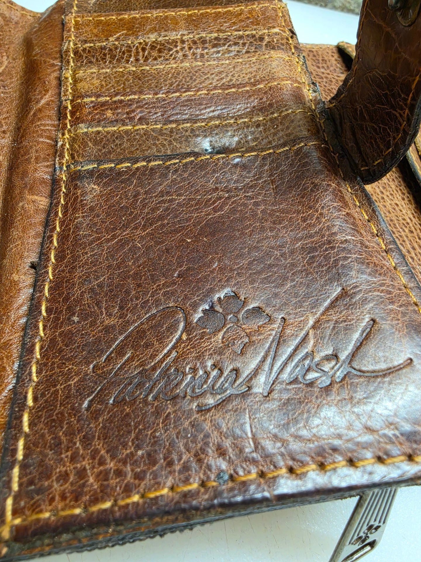 Patricia Nash Distressed Brown Leather Wallet Metal Bar Logo 8