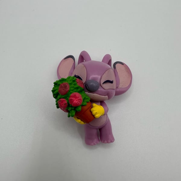 Disney Lilo & Stitch Just Play Stitch Holding Flower Bouquet Figure