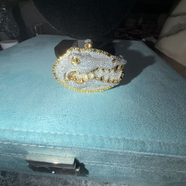 14k white and yellow gold pendant thermally infused over brass  ice cz stones 