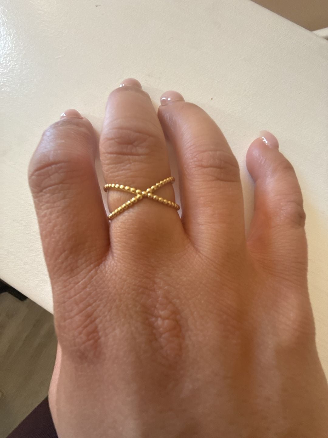 Unbranded Criss Cross Ring Size 9 Yellow Gold slid 18 K . Weight is 2.15 gramBeaded X Band 1