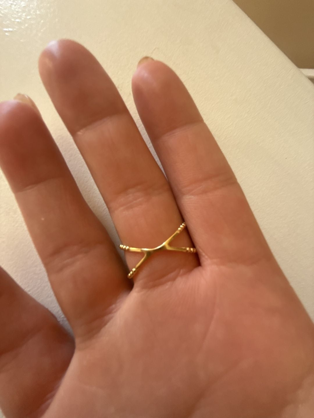 Unbranded Criss Cross Ring Size 9 Yellow Gold slid 18 K . Weight is 2.15 gramBeaded X Band 2