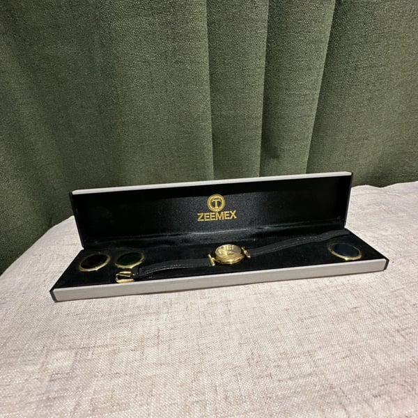 Zeemex Interchangeable Bezel Watch Gold Tone Black Leather Strap