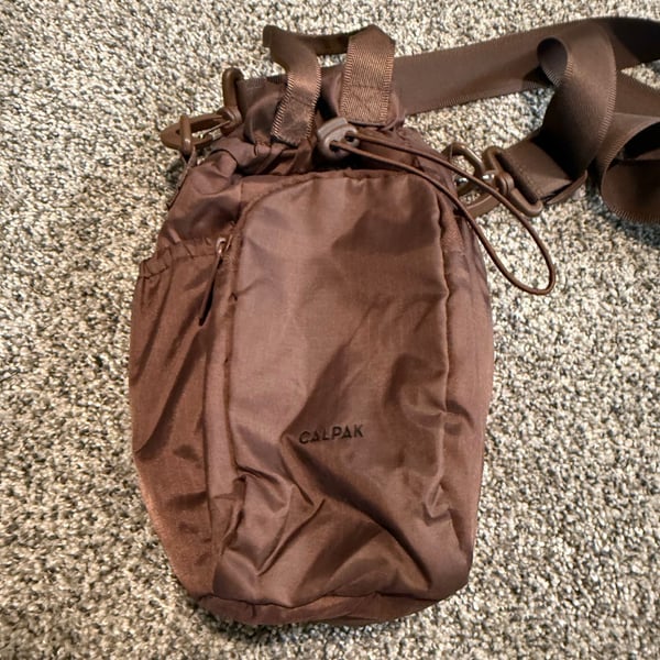 Calpak Water Bottle Holder Drawstring Crossbody Bag Brown