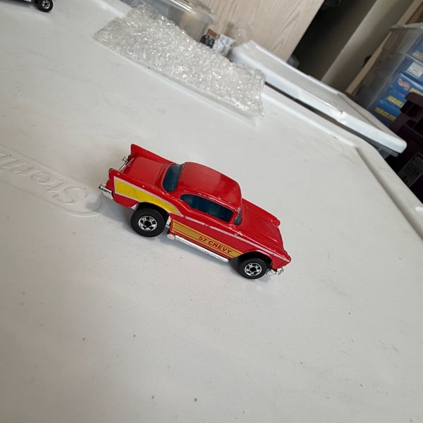 Hot Wheels '57 Chevy Red Blackwall Diecast Car