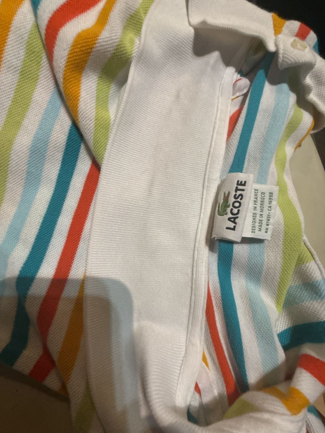 Lacoste Rainbow Striped Polo Shirt fits like a small 7
